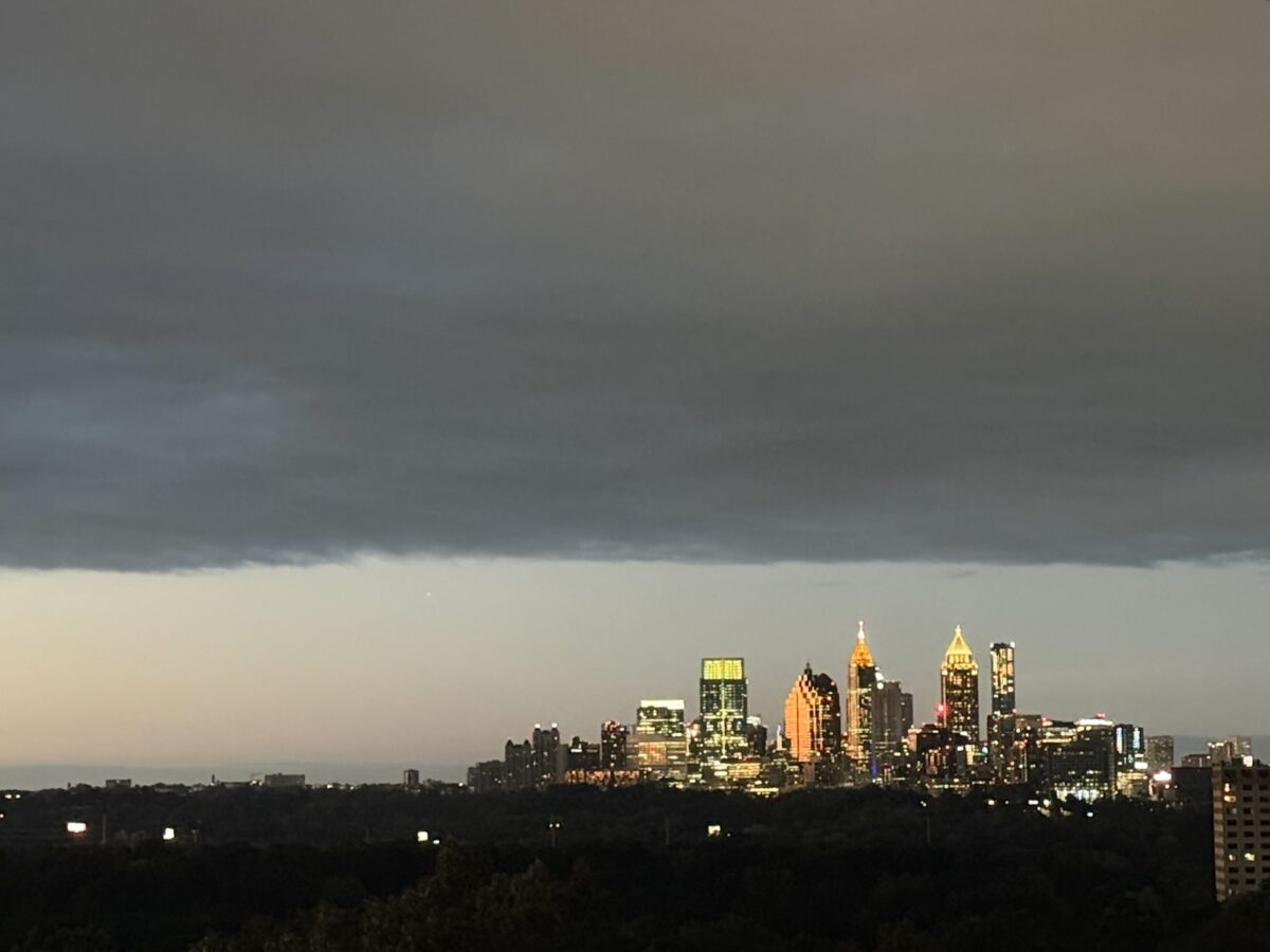 Grey cloud cover over the Atlanta skyline