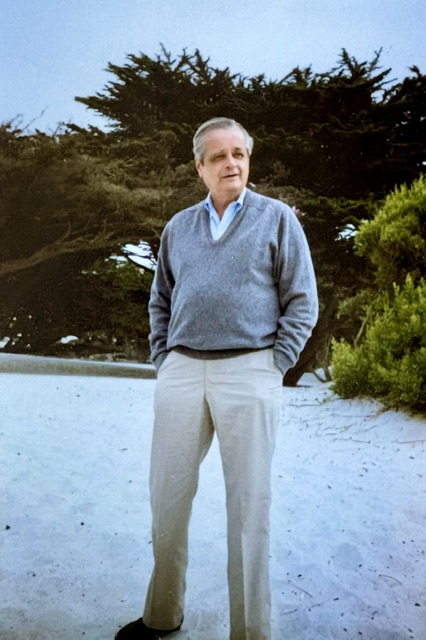 My father's sweater. He's wearing his grey wool sweater on the beach at beach at Carmel by the Sea